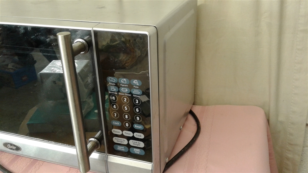 STAINLESS OSTER 700 WATT MICROWAVE