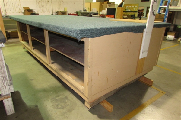 LARGE WORK TABLE WITH CARPETED TOP & ENCLOSED SHELVES ON EACH SIDE