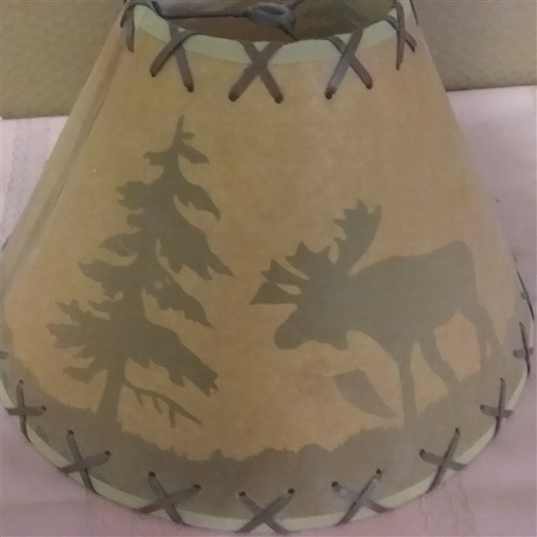 THREE PARCHMENT LAMP SHADES WITH MOOSE AND BEAR SILHOUETTES