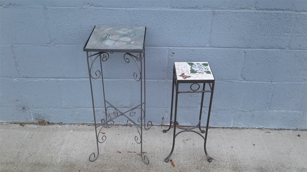 TWO METAL PLANT STANDS WITH TILE TOPS