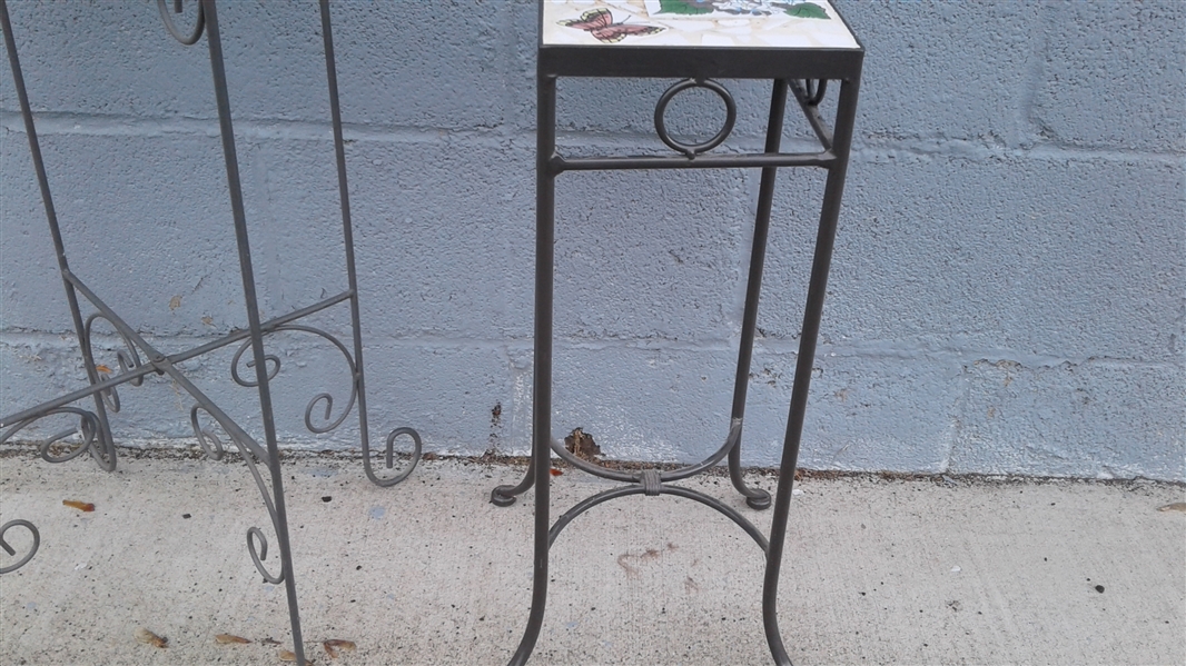 TWO METAL PLANT STANDS WITH TILE TOPS