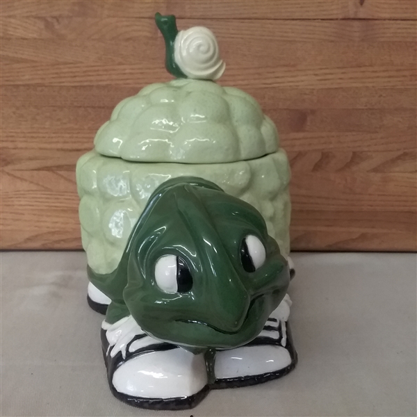 CUTTING BOARD, PENGUIN SERVER, BUTTER DISH, AND TURTLE COOKIE JAR