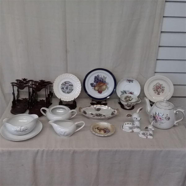 PORCELAIN AND CHINA PIECES AND 11 PLASTIC CUP AND SAUCER HOLDERS