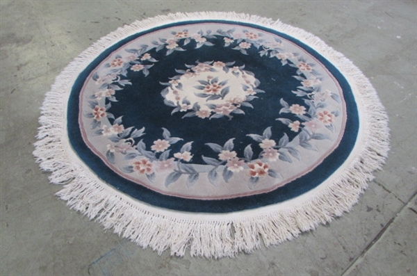 ROUND WOOL AREA RUG WITH FRINGE