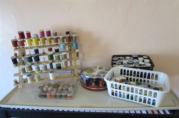 LARGE ASSORTMENT OF SEWING THREAD AND HOLDERS