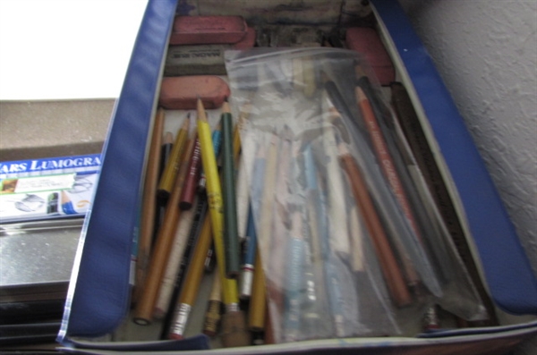 Pencils, Pens, and Art Books