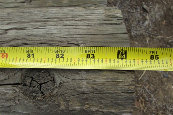 4X4 POST ON STAND, 3-ROUND POSTS & A RAILROAD TIE