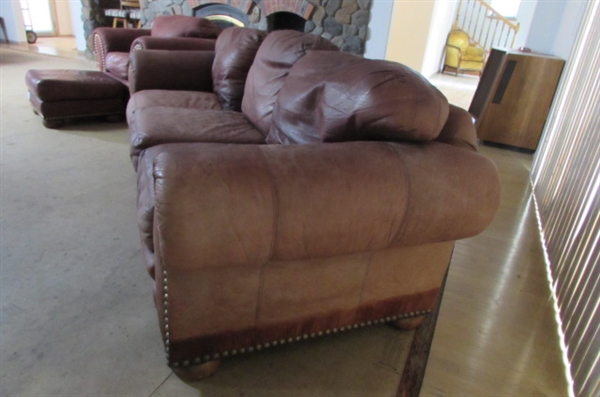 BURGUNDY LEATHER OVERSTUFFED SOFA *MATCHES CHAIR IN PREVIOUS LOT