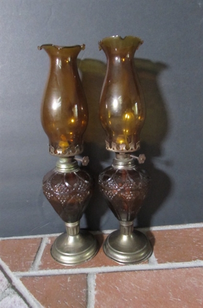 PAIR OF VINTAGE AMBER GLASS HURRICANE OIL LAMPS