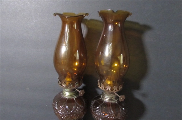 PAIR OF VINTAGE AMBER GLASS HURRICANE OIL LAMPS
