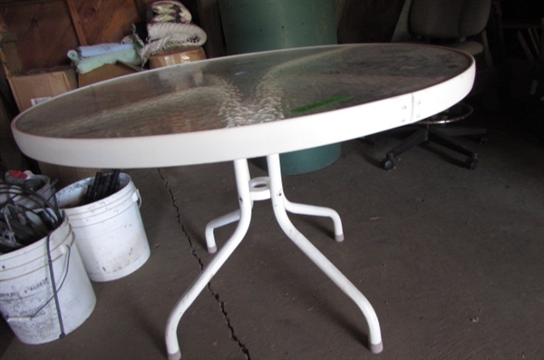 WHITE METAL PATIO TABLE WITH GLASS TOP *LOCATED AT THE PAYNE LANE ESTATE*