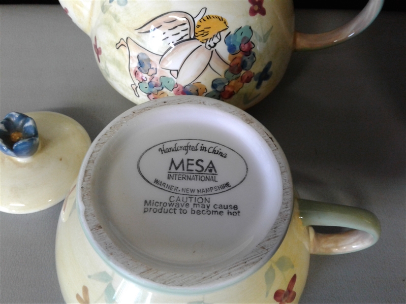 Tea Pots, Tea Cups, and Saucers