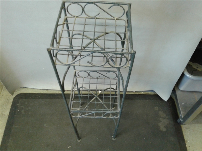 Metal Plant Stand, Watering Can, and Various Decorative Planters
