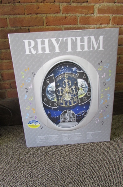 NEW IN BOX - RHYTHM PEACEFUL COSMOS MUSICAL CLOCK (15)