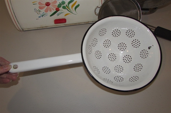 VINTAGE METAL FLOWER BREAD BOX AND A VARIETY OF KITCHEN STRAINERS