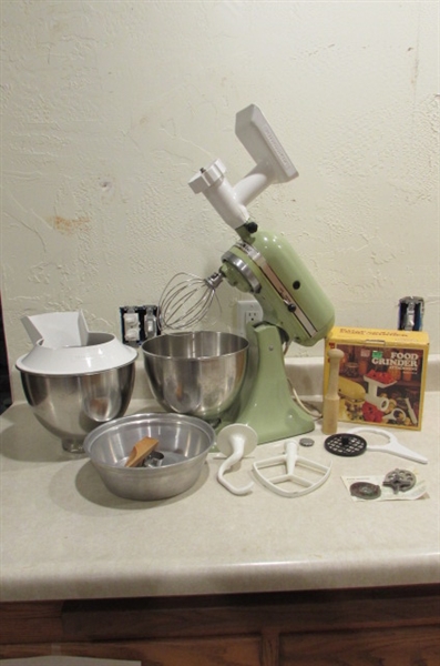 VINTAGE KITCHEN AIDE WITH FOOD GRINDER AND OTHER ATTACHMENTS