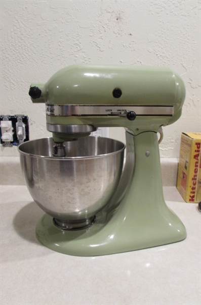 VINTAGE KITCHEN AIDE WITH FOOD GRINDER AND OTHER ATTACHMENTS