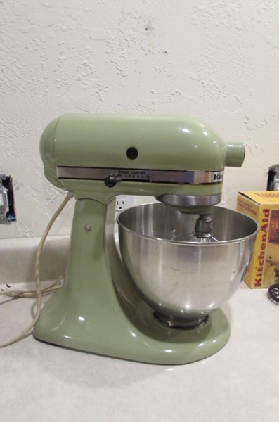 VINTAGE KITCHEN AIDE WITH FOOD GRINDER AND OTHER ATTACHMENTS