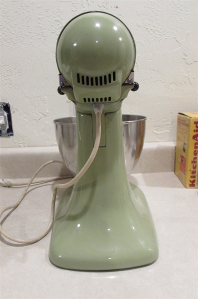 VINTAGE KITCHEN AIDE WITH FOOD GRINDER AND OTHER ATTACHMENTS