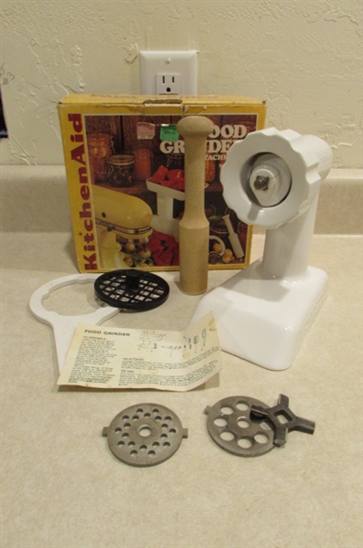 VINTAGE KITCHEN AIDE WITH FOOD GRINDER AND OTHER ATTACHMENTS