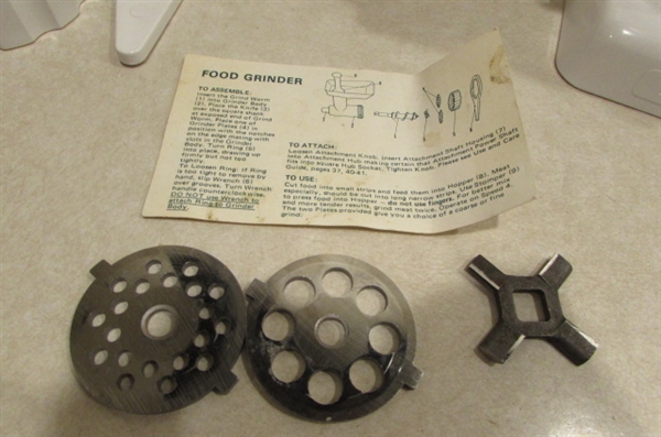 VINTAGE KITCHEN AIDE WITH FOOD GRINDER AND OTHER ATTACHMENTS