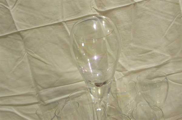 WINE BOTTLE WITH ACCESSORIES AND A VARIETY OF GLASSES