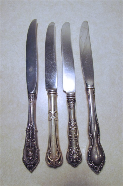 STERLING SILVER UTENSILS INCLUDING FORKS SPOONS KNIVES AND A SERVING SPATULA