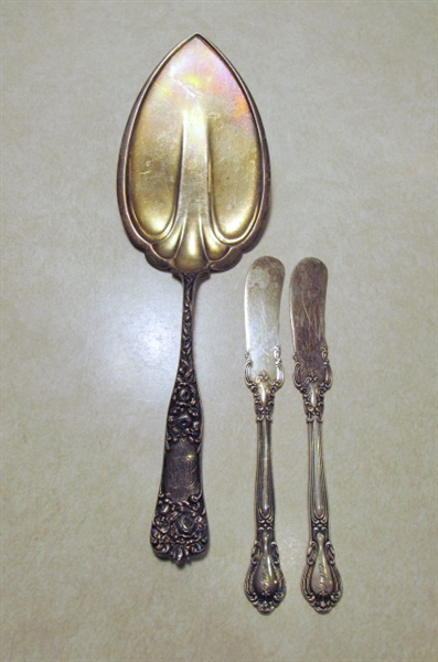 STERLING SILVER UTENSILS INCLUDING FORKS SPOONS KNIVES AND A SERVING SPATULA