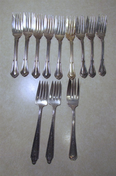 STERLING SILVER UTENSILS INCLUDING FORKS SPOONS KNIVES AND A SERVING SPATULA