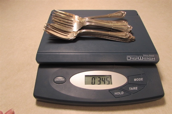 STERLING SILVER UTENSILS INCLUDING FORKS SPOONS KNIVES AND A SERVING SPATULA