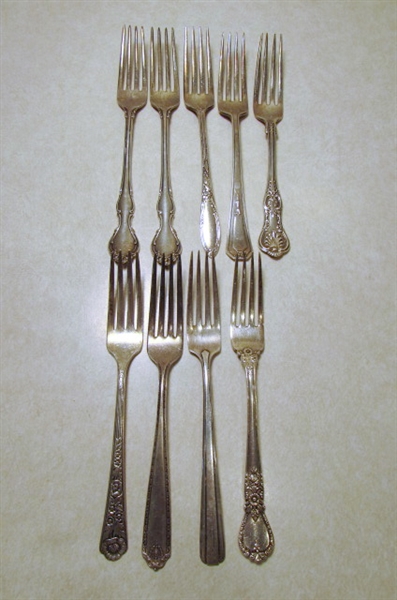 STERLING SILVER UTENSILS INCLUDING FORKS SPOONS KNIVES AND A SERVING SPATULA