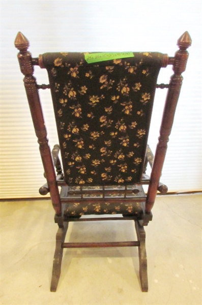 ANTIQUE WOODEN ROCKING CHAIR WITH FLORAL FABRIC PADDED SEAT AND BACK