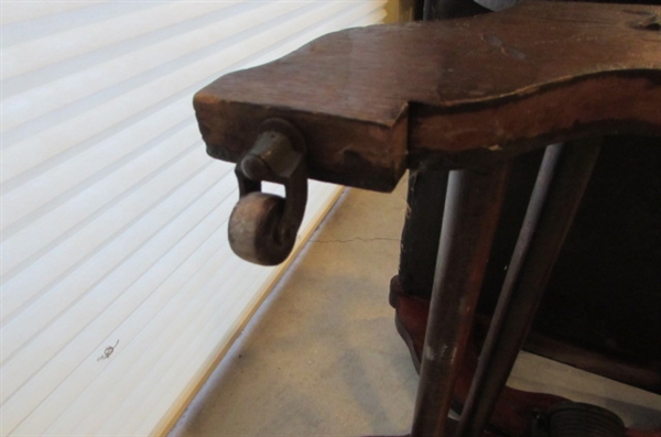 ANTIQUE WOODEN ROCKING CHAIR WITH FLORAL FABRIC PADDED SEAT AND BACK