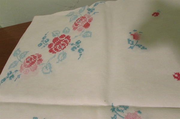 2 HAND STITCHED TABLECLOTHS AND 1 ROUND MACHINE STITCHED