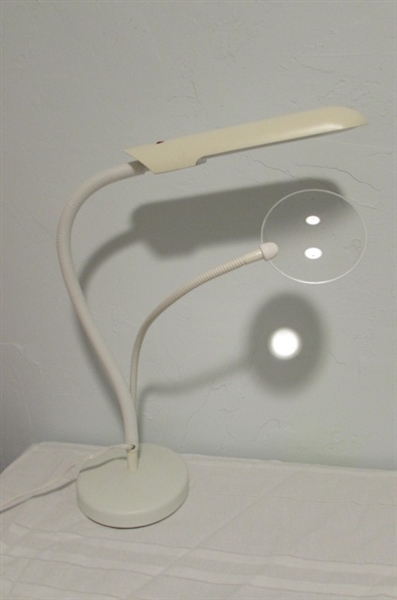 ADJUSTABLE TABLE LAMP AND MAGNIFIER.