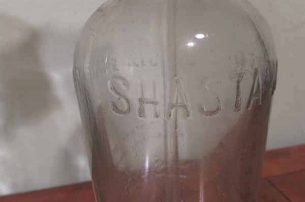 LARGER OLD BOTTLES INCLUDING A SHASTA WATER BOTTLE WITH PUMP