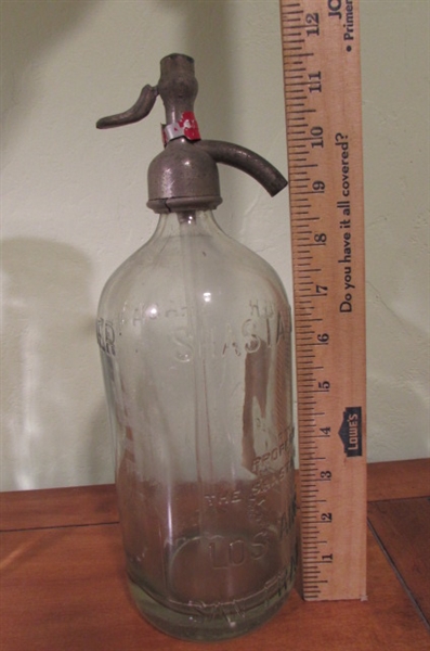 LARGER OLD BOTTLES INCLUDING A SHASTA WATER BOTTLE WITH PUMP