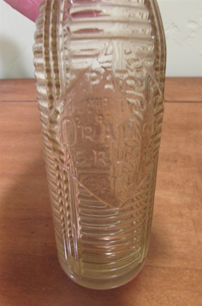 LARGER OLD BOTTLES INCLUDING A SHASTA WATER BOTTLE WITH PUMP