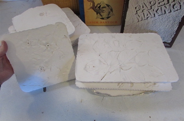 HANDMADE PAPER SHEETS AND FLOWER MOLDS.