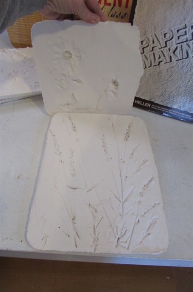 HANDMADE PAPER SHEETS AND FLOWER MOLDS.