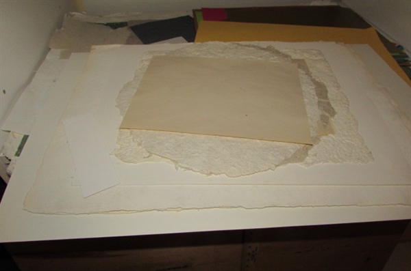 LARGE SHEETS OF HANDMADE PAPER AND OTHER COLORED STORE BOUGHT PAPER AND A HANDMADE DRAWING BOARD