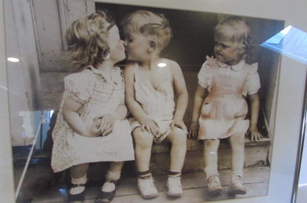 THREE CHILDREN WITH KISSING CURIOSITY