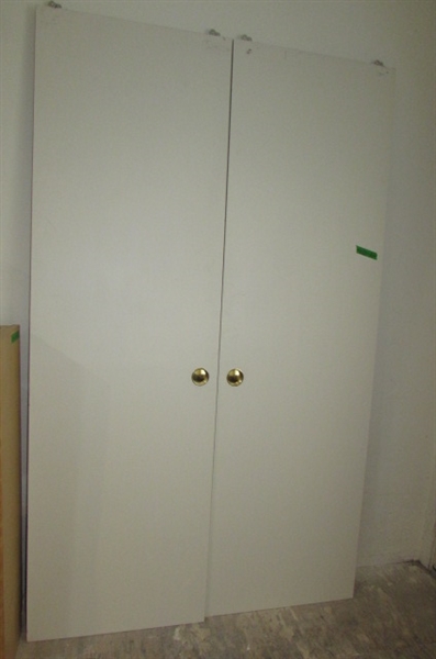 PAIR OF CLOSET DOORS