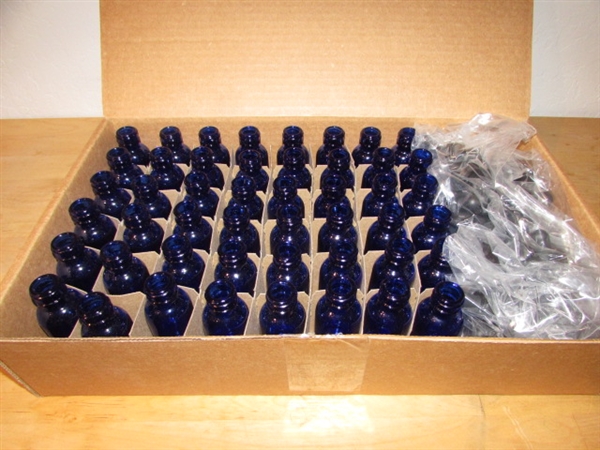 CASE OF BLUE GLASS BOTTLES WITH BULB SYRINGE TOPS