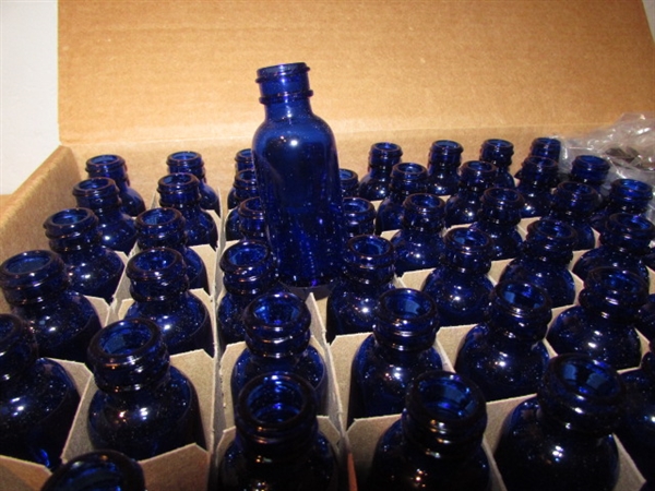 CASE OF BLUE GLASS BOTTLES WITH BULB SYRINGE TOPS