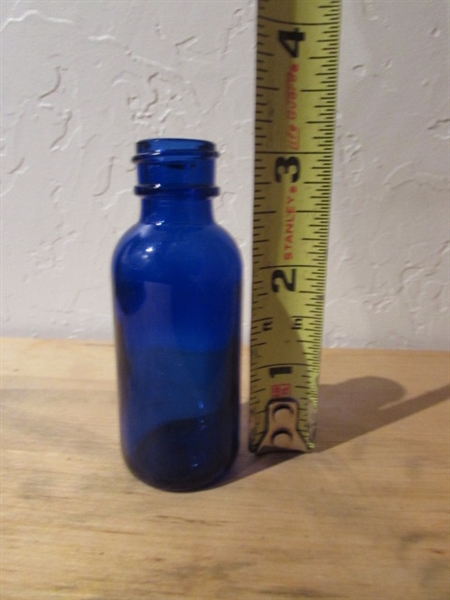 CASE OF BLUE GLASS BOTTLES WITH BULB SYRINGE TOPS