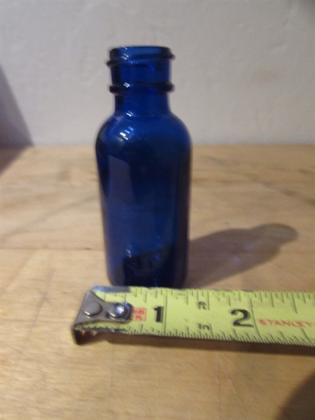 CASE OF BLUE GLASS BOTTLES WITH BULB SYRINGE TOPS