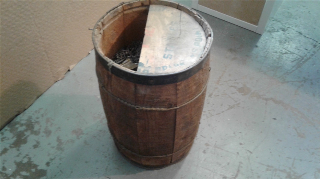 Small Wood Barrel Full of Fencing Staples