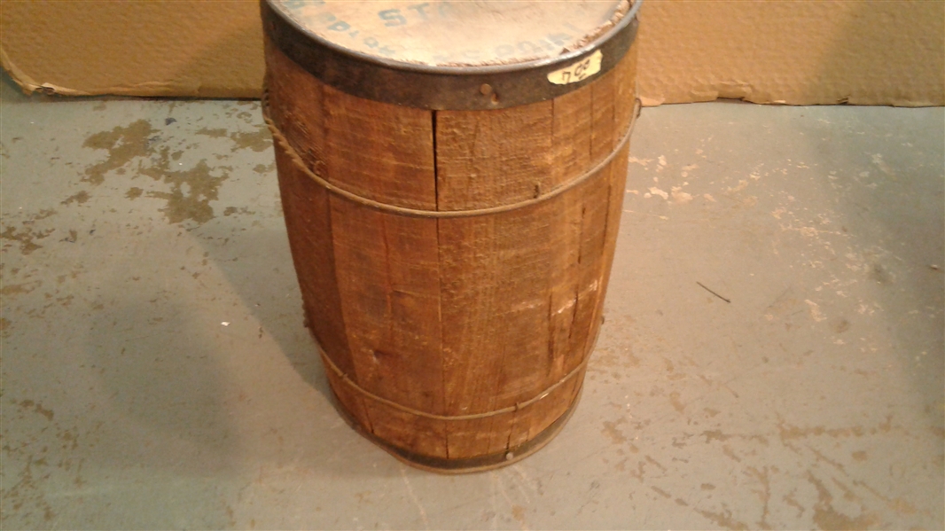 Small Wood Barrel Full of Fencing Staples