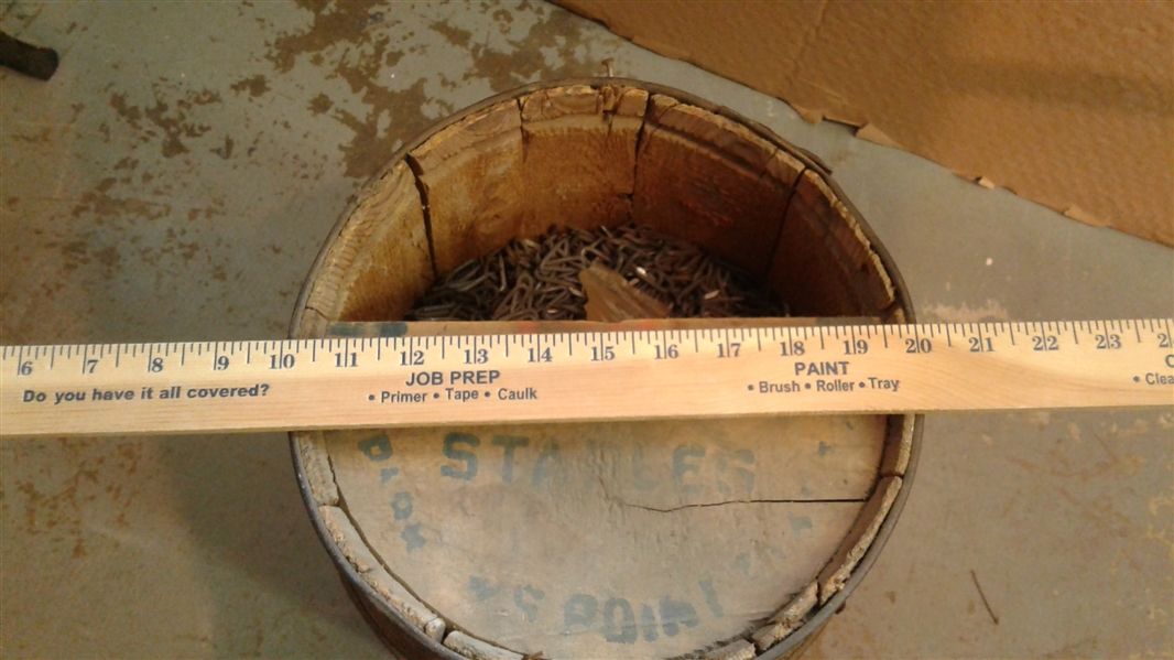 Small Wood Barrel Full of Fencing Staples